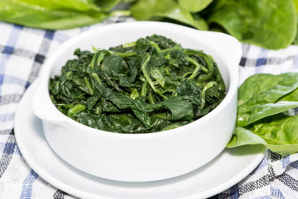 Bowl of cooked spinach